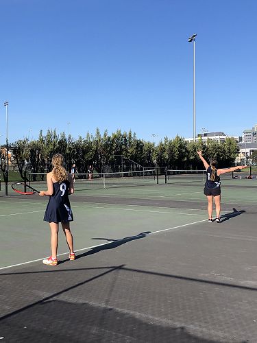 Columba Team Navy serving for the point