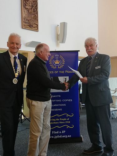 Robert Abbott receiving his certificate for 30 years of service from Graeme Barber and Southern Regional Rep Lindsay Dow.