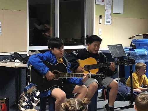 Corban and Eric performing at the Soiree.