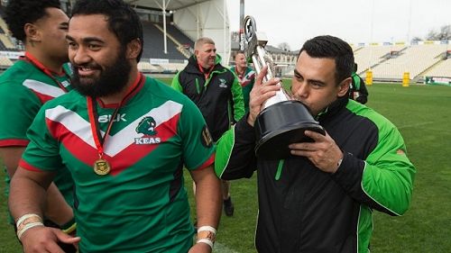 Andrew Auimatagi kisses the Pat Smith Trophy