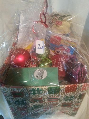 2nd prize - Burgess Automotive service voucher, $100 Bishopdale New world grocery voucher,Iced rich fruit cake from Kidds cakes and a Christmas hamper.