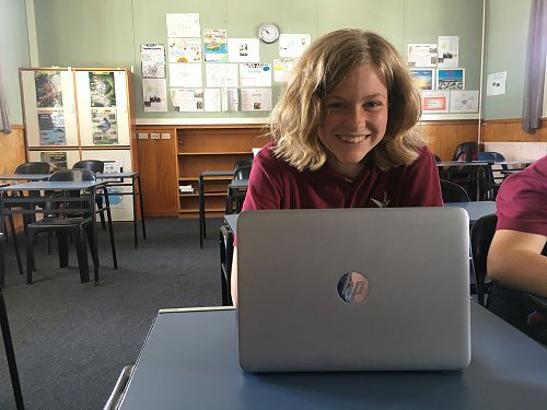 Emily Furniss is happy with her HP Elite book