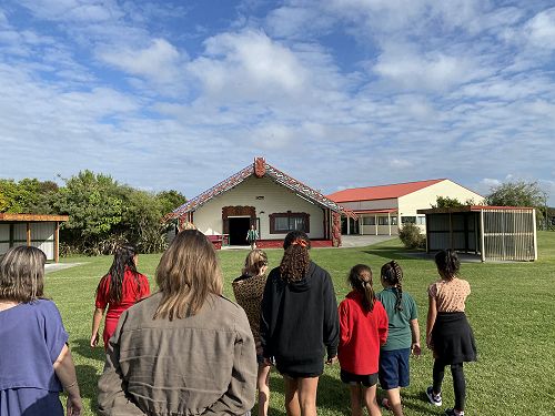 Kit Day Marae walking onto Marae powhiri