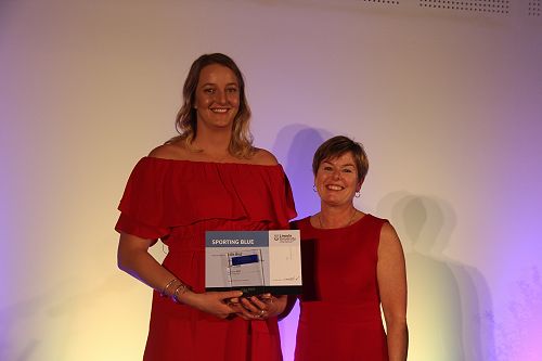 Ellie Bird receiving her Lincoln University Blue for Netball from Chief Operating Officer Philippa Jones