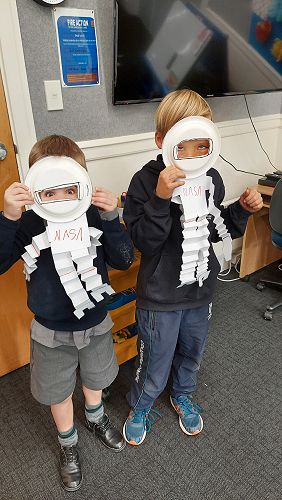 Torran and Jesse sharing their astronaut