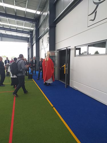 Bishop Paul cutting the ribbon to the Sports Complex