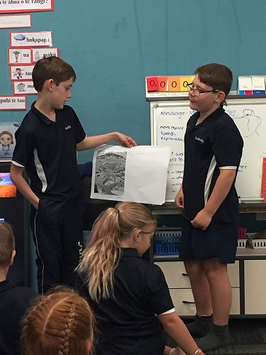 Billy and Blake sharing their ideas.