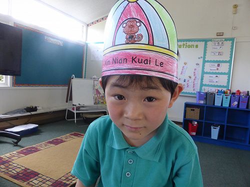 Kazuki wearing his Chinese New Year hat