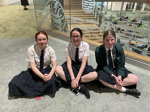 Relaxing while the adjudicators make their decision on the last debate on Saturday evening (l-r) Isobel Fraser, Abby Bowmar and Jody Syme