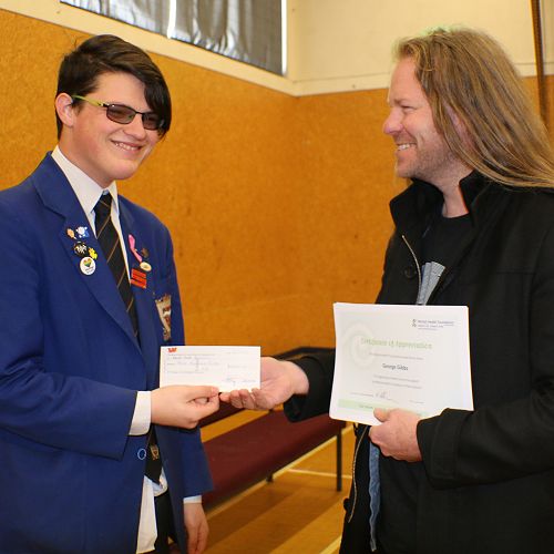 George Gibbs presents $3000 cheque to Cieran from The Mental Health Foundation