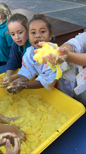 Words come up through learners' hands and are captured for them by the teacher.