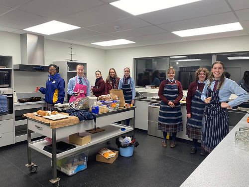 Z Club members volunteering at the 2023 Pink Breakfast