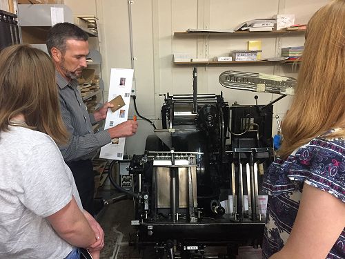 Matt explains the inking process.