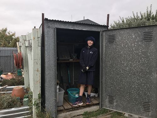 Katie getting ready for some gardening.