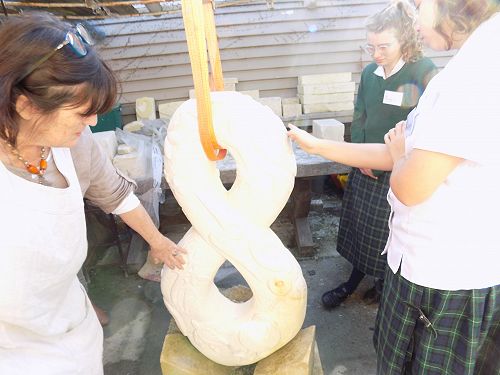 Explaining our Unity Sculpture to Rebecca.