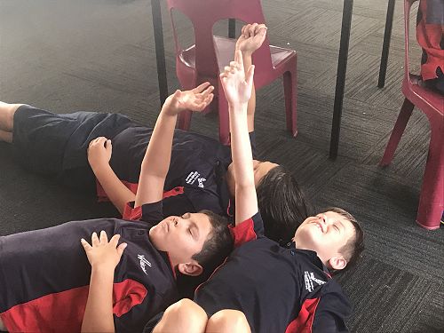 Lukas, Levi and Zack are enjoying the 'Mindfulness' session.