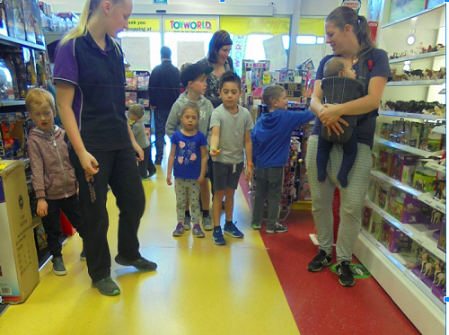 Riley working at Toyworld. 