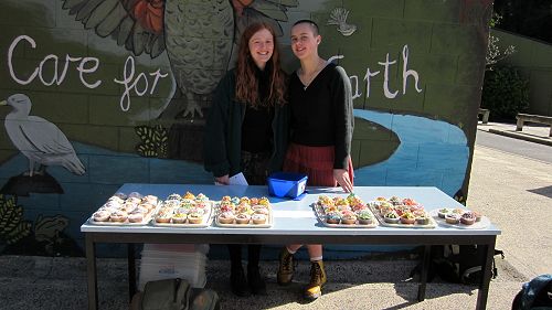 Frances Barnett and Vyvienne Evans selling cupcakes.  