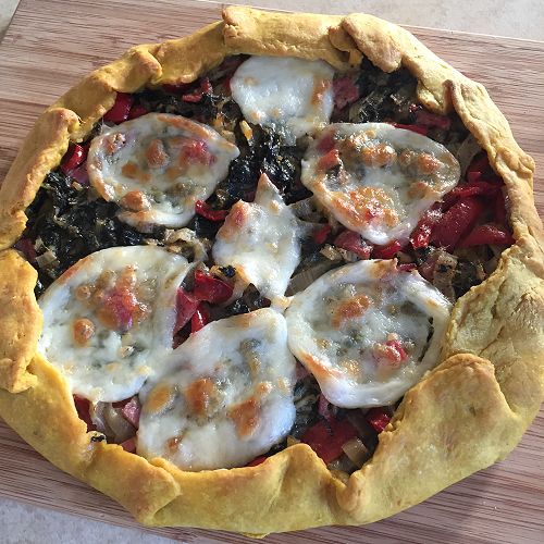 Silver beet and mushroom galette with buffalo cheese for Feb 2023 morning tea.