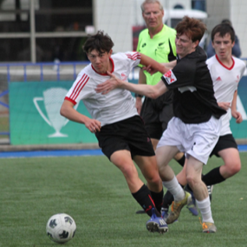 Battling it out: First XI's Tyler Mawhinney in action against Christ College.