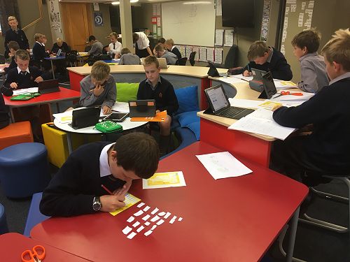 Taking part in Get NZ Writing - Year 7s constructing their poems to send to our buddy school in Cambridge