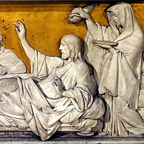 Bas relief of woman pouring perfumed ointment on Jesus' head in Simon's house