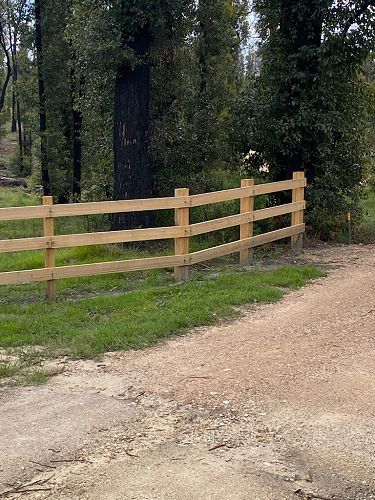 Fencing materials cut from logs that were fallen in fires