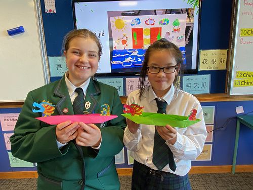 Year 7 Emily Berry and Selena Chan make dragon boat