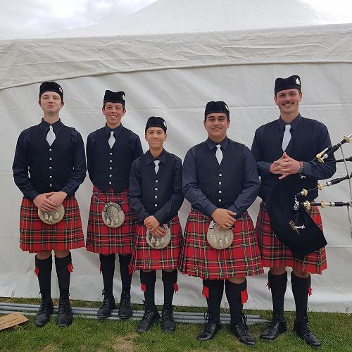 From left; OE Hayward (Logan Park High School), Joel Wilden (King’s High School), Caleb Ung (John McGlashan College), Qwenton McKenzie (John McGlashan College) and Louis Davis (Pipe Band director).