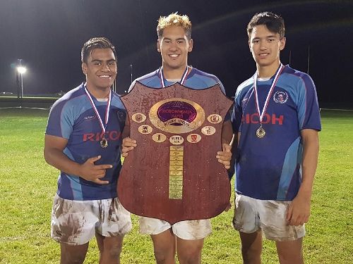 Three of the senior Manawatū College 1st XV players, Shae Gray, Harry Mehana (Captain) and Jay Jay Hailwood, with the Horowhenua – Kapiti Rugby Union Super 6 Shield.