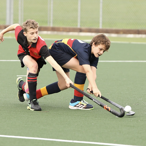 Amos Miller attacks the ball.