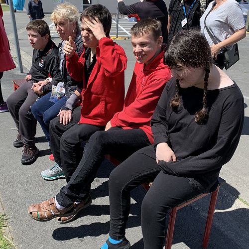 Room 10 students waiting for their turn with the dunk tank. 