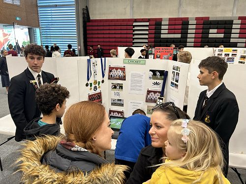 Angus Reeves (left) answers questions about HBHS Cricket