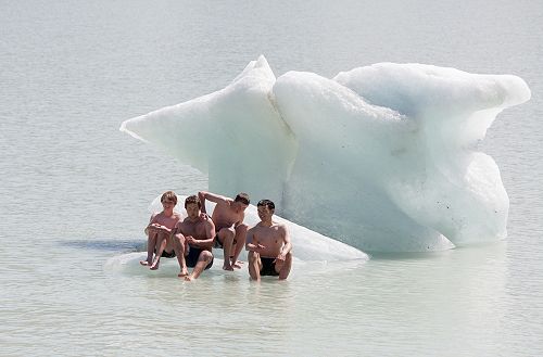 Lachlan Kenneally, Andrew Hughes, Tom Shallard and Mr Brown have a brief rest in the sun on the iceberg.