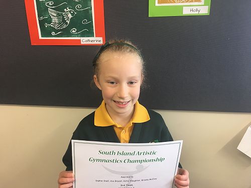 Katie enjoying the success of her recent Gymnastics competition.