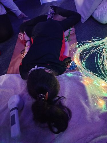 Mikayla loves the Dark room. Here she is enjoying the subtle lighting from our new Fibre optic strings.