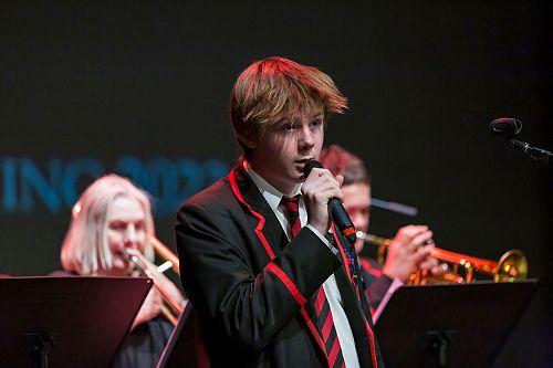 Liam Hulme, singing in Bede's Per Minute, the St Bede's College jazz band.