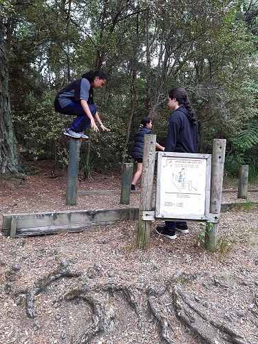 Mercedies trying out the fitness trail, while Rahui offers support
