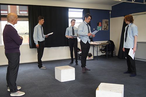 Hone works with the boys on their scene.