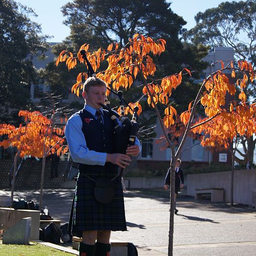 Sam Darling pipes the school into the ANZAC service