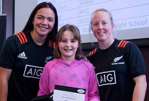 Amelia is all smiles along with Black Ferns Stacey Waaka and Kendra Cocksedge.