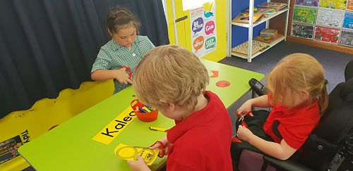 Making our first day at school medals