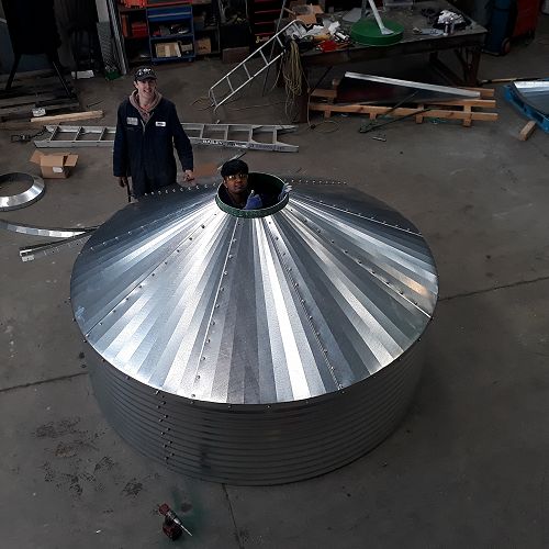 Vivian working on the inside of a silo at Dan Cosgrove Lt