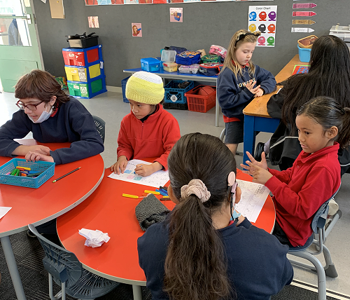 Teaching NZSL in our Wharenui Classes