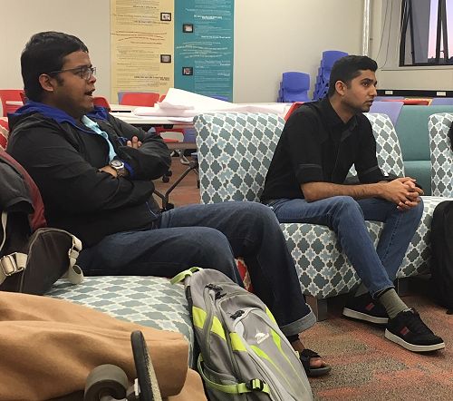 Rahul and AJ listening in.