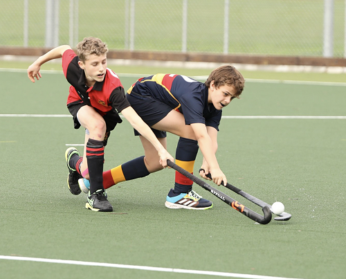 Amos Miller attacks the ball.