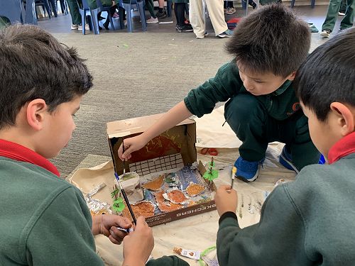 Ra, Ryan and Junhan working on their diorama.
