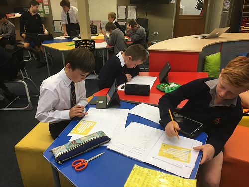 Taking part in Get NZ Writing - Year 7s constructing their poems to send to our buddy school in Cambridge