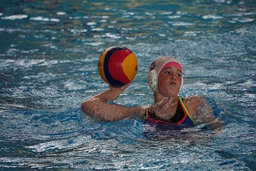 Billie-Rose passing to her team mates. 