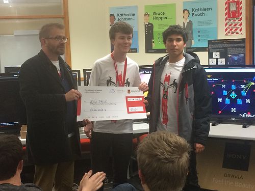 Nayland
students Matthew Suter and Ruben Castaing receive an over-sized cheque for $20
for being the first team to complete one of the challenges.